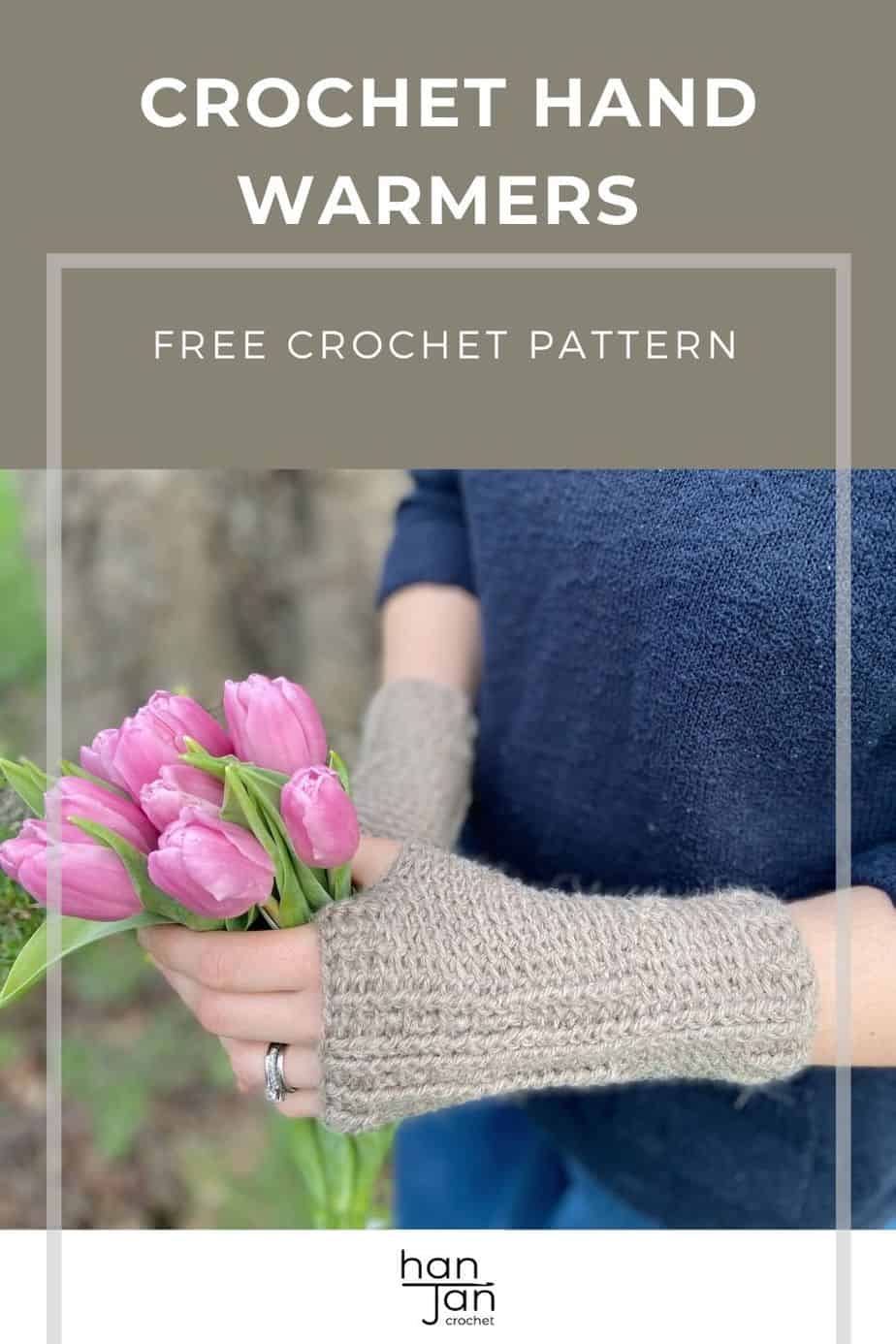 fingerless crochet mittens on hands holding a bunch of pink tulips