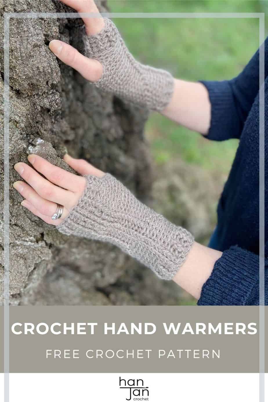 woman holding tree wearing beige brown crochet hand warmers 