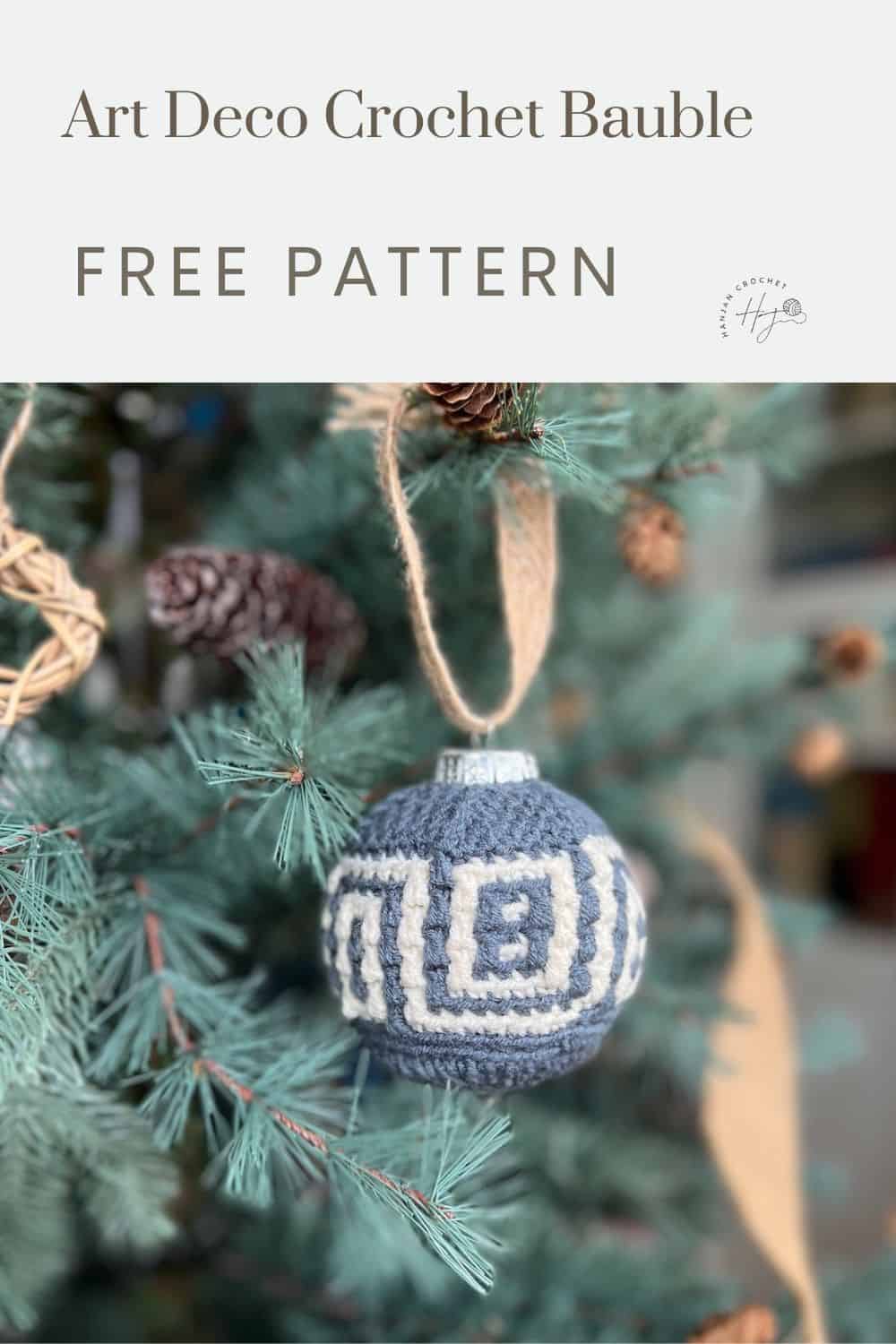 A crochet bauble with an Art Deco design hangs from a Christmas tree. The text reads: "Free Art Deco Crochet Bauble Pattern.