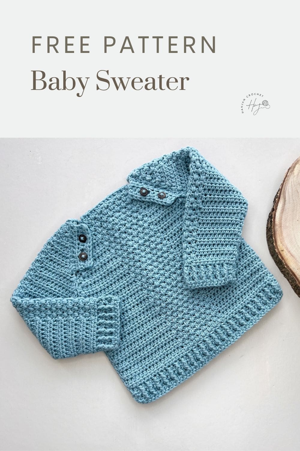 A crocheted blue baby sweater with button details on the shoulders, displayed on a light background. Text reads "FREE PATTERN Baby Crochet Sweater.