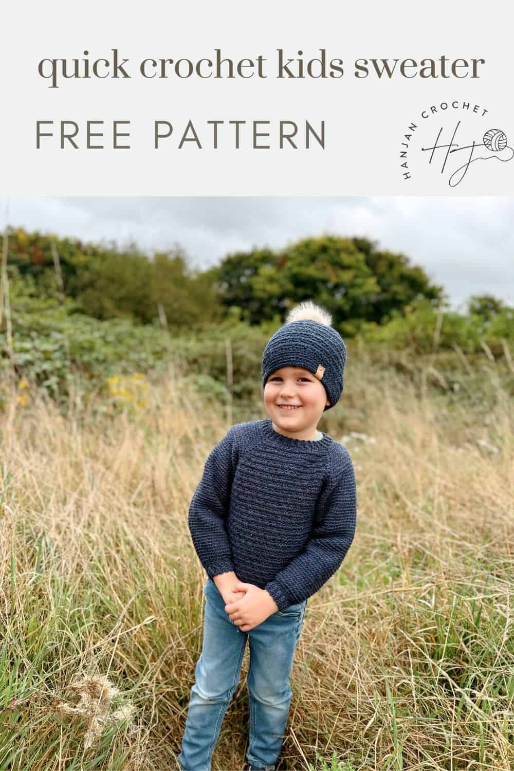 Child in a blue crocheted sweater and hat stands in a grassy field. Text reads: "Easy Crochet Kids Sweater Free Pattern.